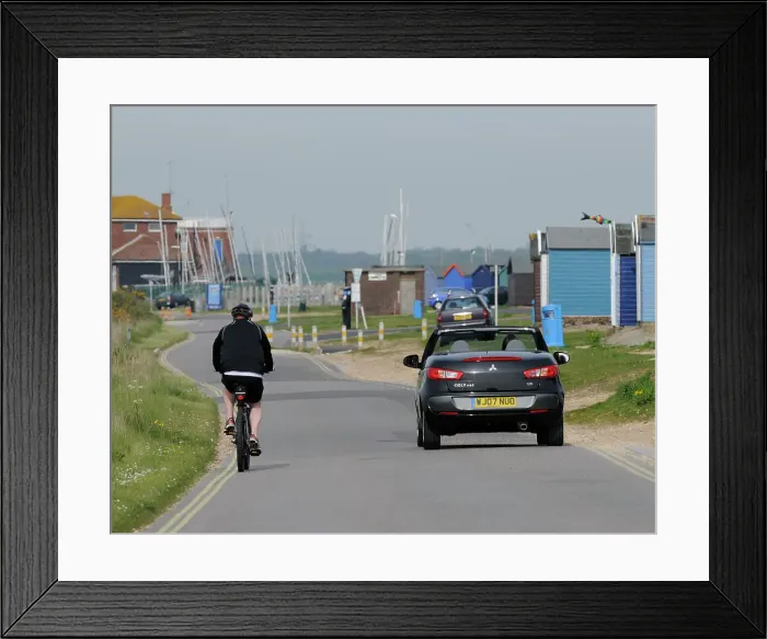 Framed Print : Mitsubishi Colt CZC cabriolet overtaking cyclist Framed Print : Mitsubishi Colt CZC cabriolet overtaking cyclist