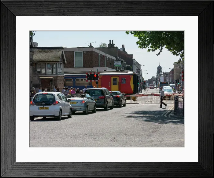 Framed Print : Train passing through level crossing in Lincoln 2014 Framed Print : Train passing through level crossing in Lincoln 2014