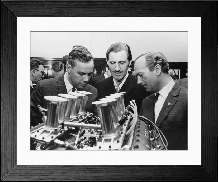 Framed Print : Graham Hill with Colin Chapman, c1967-c1970