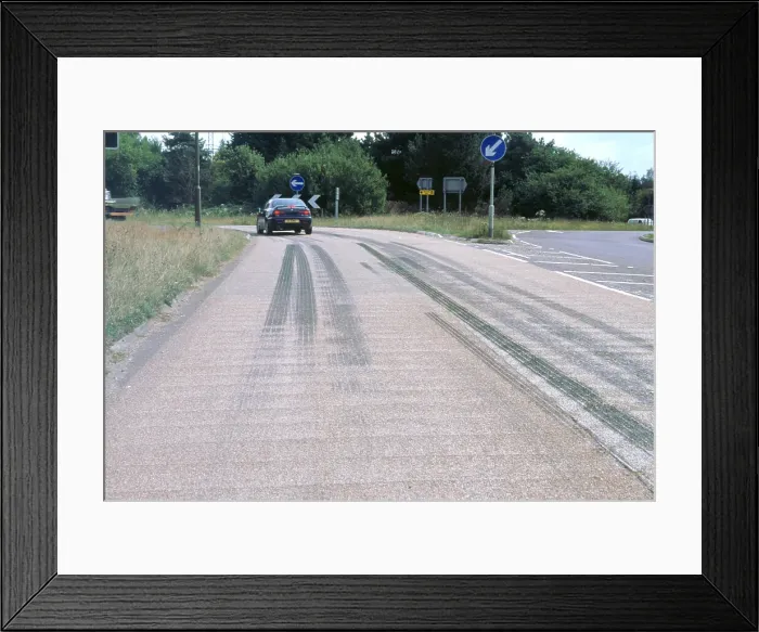 Framed Print : Tyre skidmarks on road surface Framed Print : Tyre skidmarks on road surface