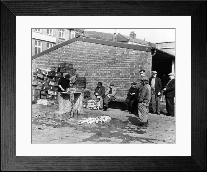 Framed Print : Gutting fish outside a warehouse in Whitby, North Yorkshire, 1959 Framed Print : Gutting fish outside a warehouse in Whitby, North Yorkshire, 1959