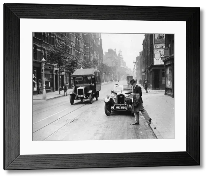 Framed Print : A Rover 1928 10 / 25 HP sports car parked in a London street, 1931 Framed Print : A Rover 1928 10 / 25 HP sports car parked in a London street, 1931