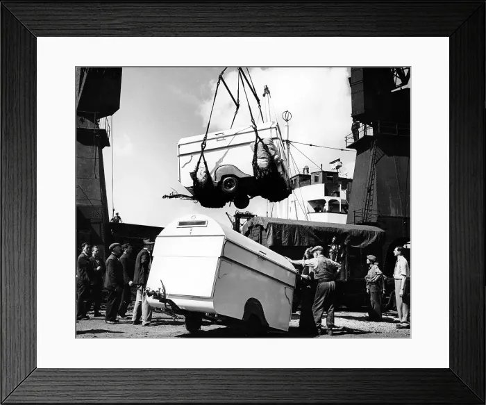 Framed Print : Unloading trailers from a ship, (c1950s?) Framed Print : Unloading trailers from a ship, (c1950s?)