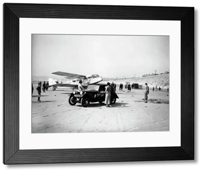Framed Print : Riley Kestrel and a Dragon aircraft on a beach, 1934 Framed Print : Riley Kestrel and a Dragon aircraft on a beach, 1934