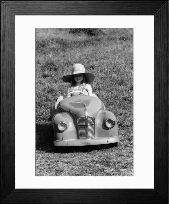 Framed Print : Girl in a 1948 vintage Austin J40 pedal car Framed Print : Girl in a 1948 vintage Austin J40 pedal car