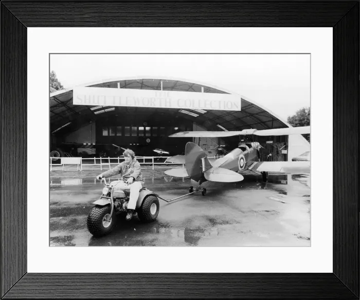 Framed Print : A Honda all terrain cycle pulling a vintage biplane, 1982 Framed Print : A Honda all terrain cycle pulling a vintage biplane, 1982