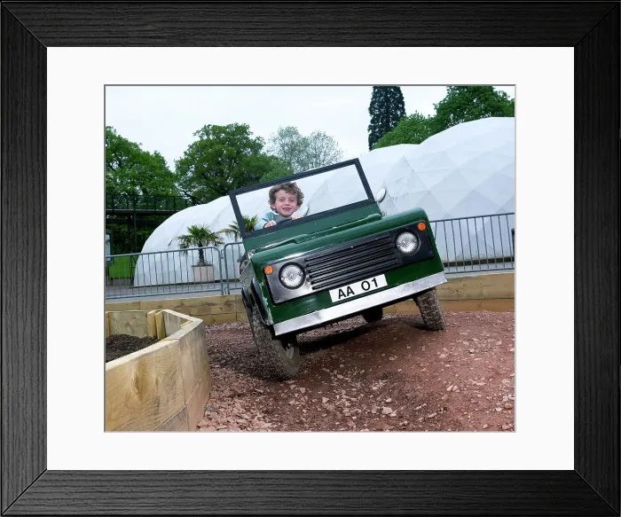 Framed Print : Child driving a toy Land Rover Framed Print : Child driving a toy Land Rover