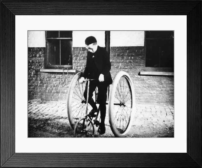 Framed Print : Johnny Dunlop riding his tricycle with rubber tyres, 1888 Framed Print : Johnny Dunlop riding his tricycle with rubber tyres, 1888