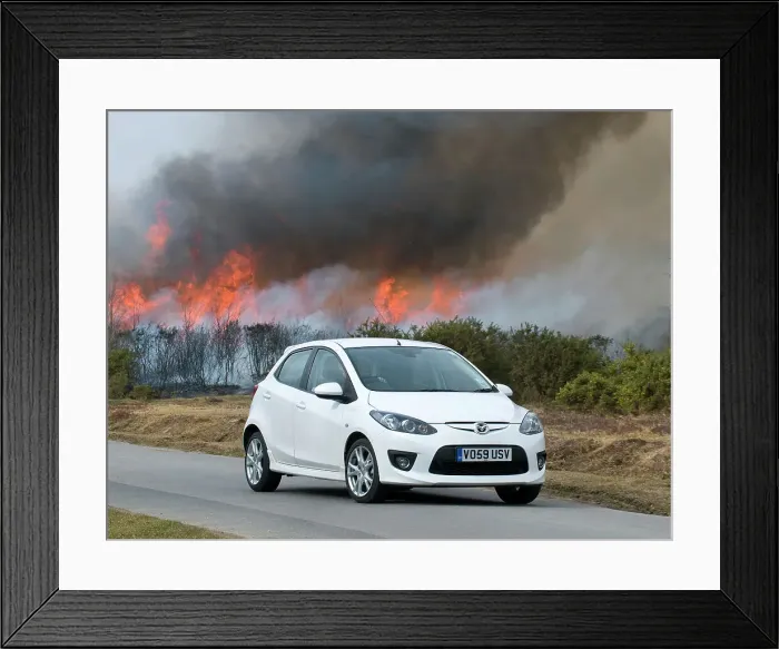 Framed Print : 2010 Mazda 2 Sport, controlled burning in New Forest Framed Print : 2010 Mazda 2 Sport, controlled burning in New Forest