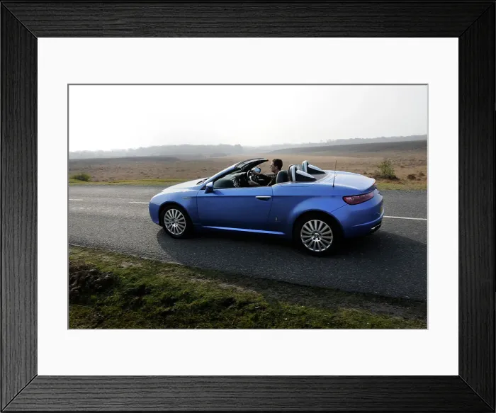 Framed Print : 2006 Alfa Romeo Spyder driving in New Forest Framed Print : 2006 Alfa Romeo Spyder driving in New Forest