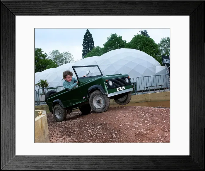 Framed Print : Child driving a toy Land Rover Framed Print : Child driving a toy Land Rover