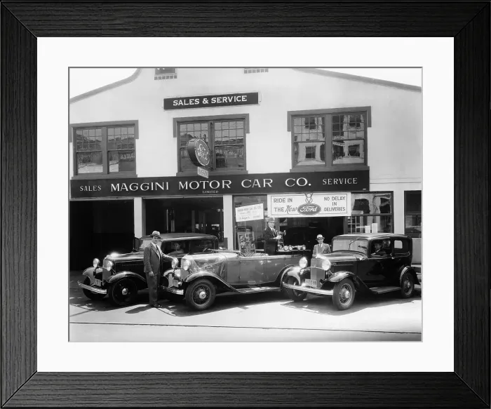 Framed Print : 1932 Ford V8 in front of a car showroom, (c1932?) Framed Print : 1932 Ford V8 in front of a car showroom, (c1932?)