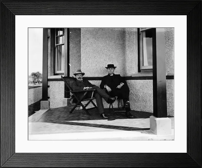 Framed Print : Lloyd George resting on the verandah of a house Framed Print : Lloyd George resting on the verandah of a house