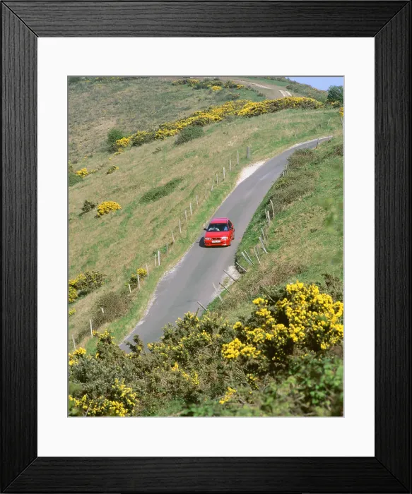 Framed Print : 1996 Suzuki Baleno GS Sport on winding country lane, Dorset Framed Print : 1996 Suzuki Baleno GS Sport on winding country lane, Dorset