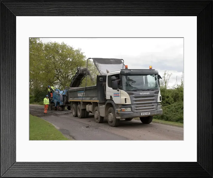 Framed Print : Road resurfacing work repairing potholes Framed Print : Road resurfacing work repairing potholes