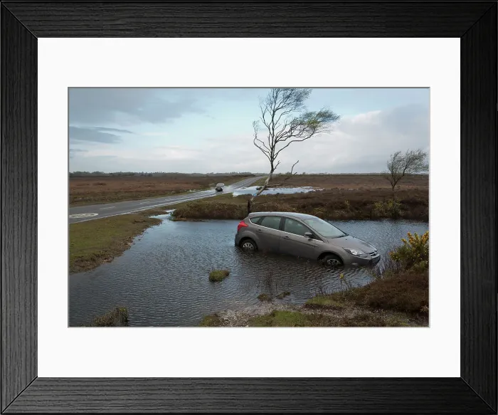Framed Print : Ford Focus in flooded ditch after losing control on wet road 2012 Framed Print : Ford Focus in flooded ditch after losing control on wet road 2012