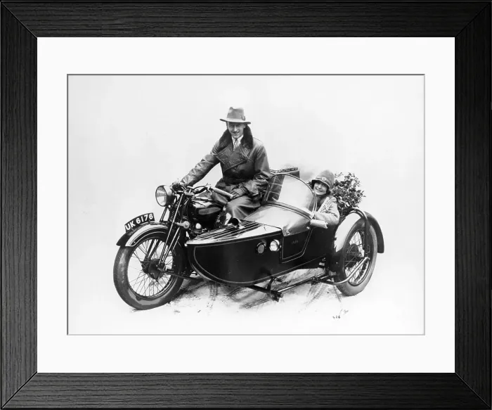 Framed Print : Man riding an AJS motorbike with a woman in the sidecar, 1939 Framed Print : Man riding an AJS motorbike with a woman in the sidecar, 1939