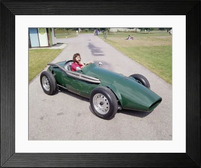 Framed Print : Eric Clapton in a 1955 Connaught, (c1970s?) Framed Print : Eric Clapton in a 1955 Connaught, (c1970s?)