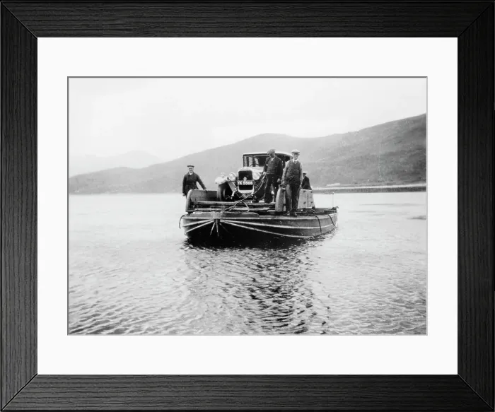 Framed Print : An early ferry transporting a car across a lake Framed Print : An early ferry transporting a car across a lake