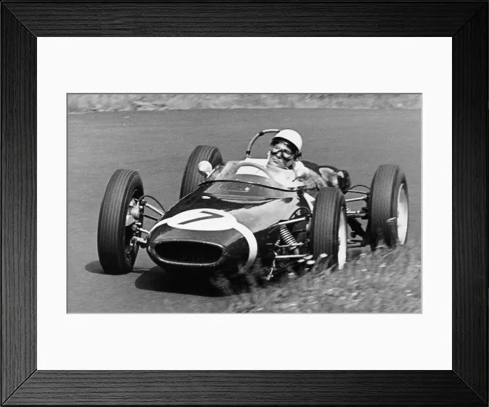 Framed Print : Stirling Moss taking a bend in a racing car, (c1960-c1961?) Framed Print : Stirling Moss taking a bend in a racing car, (c1960-c1961?)