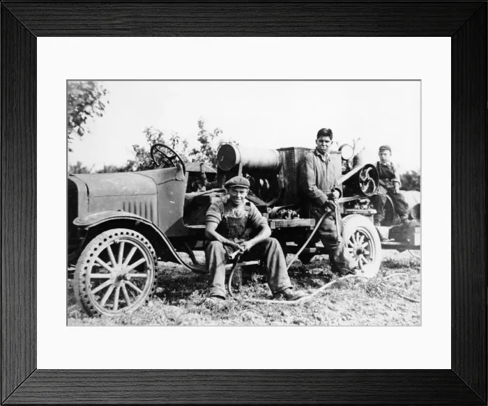 Framed Print : Farmworkers with a tractor, (c1930s?) Framed Print : Farmworkers with a tractor, (c1930s?)