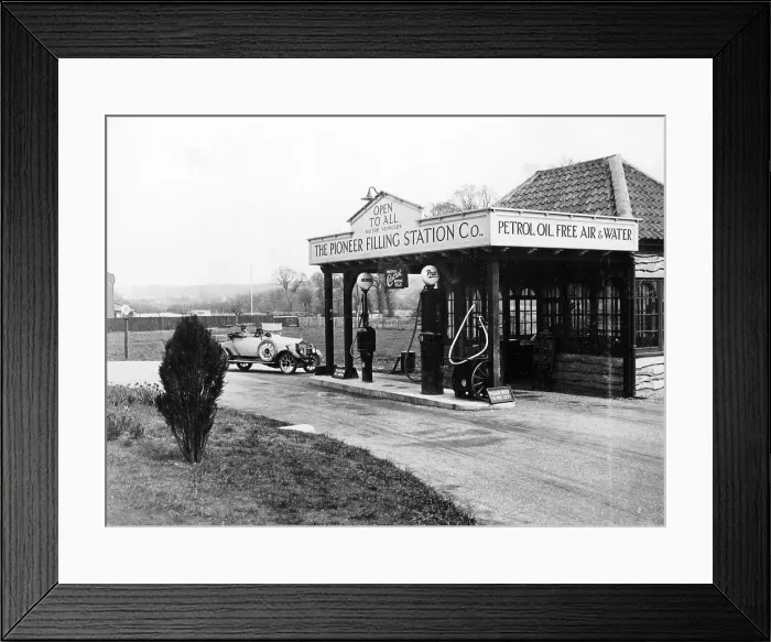Framed Print : 1923 10 hp Calcott arriving at a petrol station, (c1923?) Framed Print : 1923 10 hp Calcott arriving at a petrol station, (c1923?)