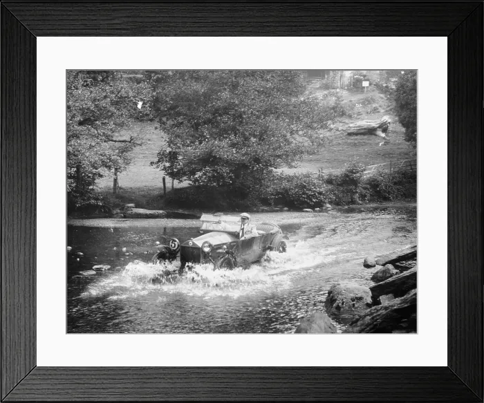 Framed Print : A Lancia Lambda being driven through water, c1925 Framed Print : A Lancia Lambda being driven through water, c1925