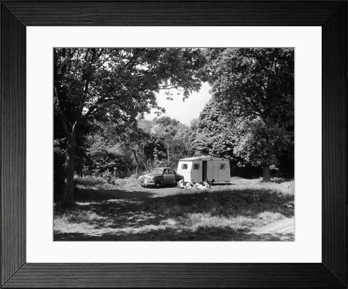 Framed Print : A family relaxing on holiday with their 1951 Vauxhall Wyvern and caravan, (1951?) Framed Print : A family relaxing on holiday with their 1951 Vauxhall Wyvern and caravan, (1951?)