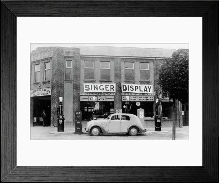 Framed Print : A Singer 11hp Airstream saloon car outside a Welsh garage, Wales, 1935 Framed Print : A Singer 11hp Airstream saloon car outside a Welsh garage, Wales, 1935