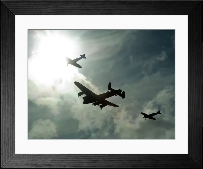 Framed Print : 2011 Goodwood Revival Meeting, Lancaster bomber and 2 Spitfires in aerial display