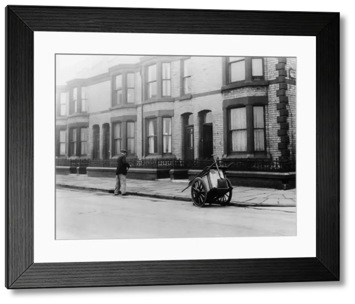 Framed Print : An Orderly Boy and his cart sweeping a street, Liverpool, 1935 Framed Print : An Orderly Boy and his cart sweeping a street, Liverpool, 1935