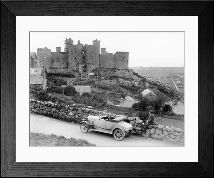 Framed Print : A Singer car in front of Harlech Castle, Wales, early 1920s Framed Print : A Singer car in front of Harlech Castle, Wales, early 1920s