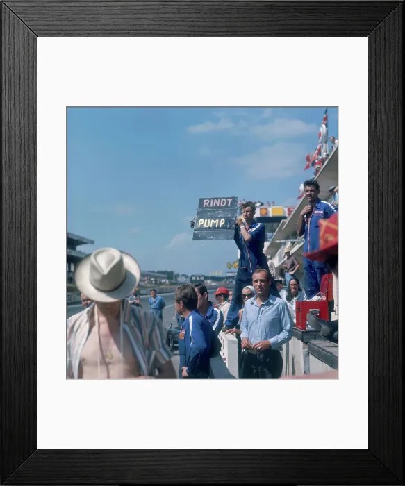 Framed Print : A mechanic holding up a sign, French Grand Prix, Le Mans, France, 1967 Framed Print : A mechanic holding up a sign, French Grand Prix, Le Mans, France, 1967