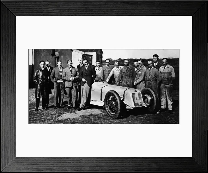 Framed Print : Robert Benoist with a cigarette, leaning against a Delage 15-S8, 1927 Framed Print : Robert Benoist with a cigarette, leaning against a Delage 15-S8, 1927