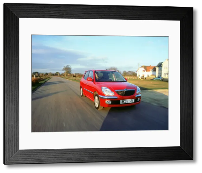 Framed Print : 2002 Daihatsu Sirion 1.3 SL Framed Print : 2002 Daihatsu Sirion 1.3 SL