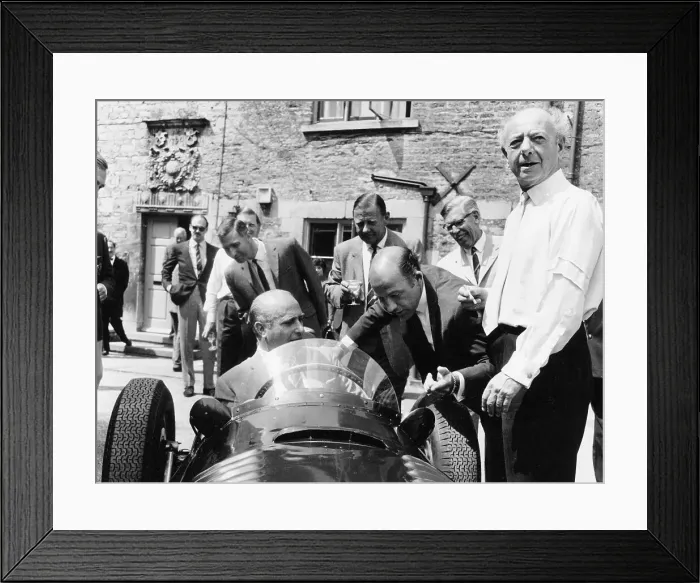 Framed Print : Juan Manuel Fangio at the wheel of a V16 BRM, (1960s?) Framed Print : Juan Manuel Fangio at the wheel of a V16 BRM, (1960s?)