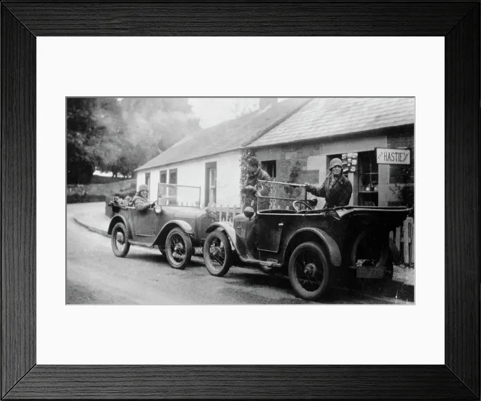Framed Print : Two Austin Sevens parked outside a small tea shop, c1925 Framed Print : Two Austin Sevens parked outside a small tea shop, c1925