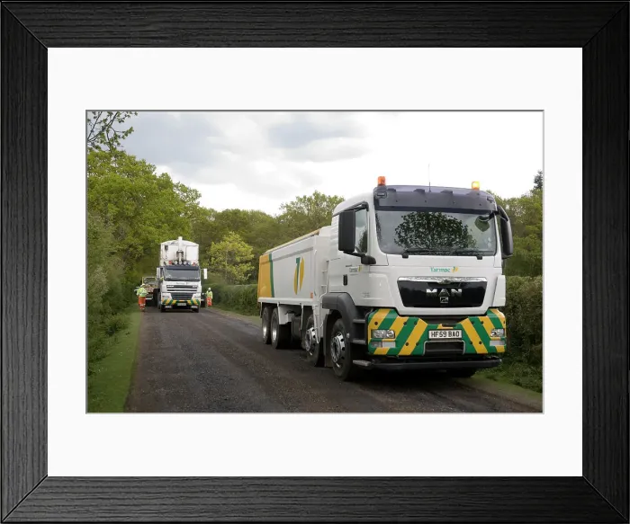 Framed Print : Road resurfacing work repairing potholes Framed Print : Road resurfacing work repairing potholes
