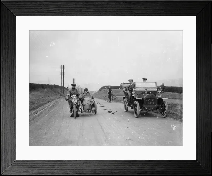 Framed Print : A motorcycle and sidecar passing a car and cyclist on the road Framed Print : A motorcycle and sidecar passing a car and cyclist on the road