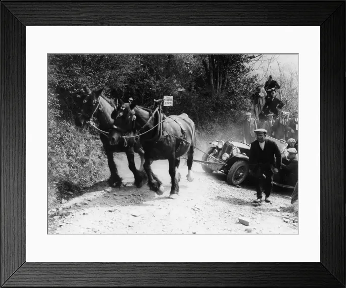 Framed Print : Horses pulling an MG up a hill, c1936 Framed Print : Horses pulling an MG up a hill, c1936