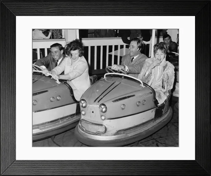 Framed Print : Graham Hill and Jim Clark on Dodgem cars at Butlins, Bognor Regis, 1960s Framed Print : Graham Hill and Jim Clark on Dodgem cars at Butlins, Bognor Regis, 1960s