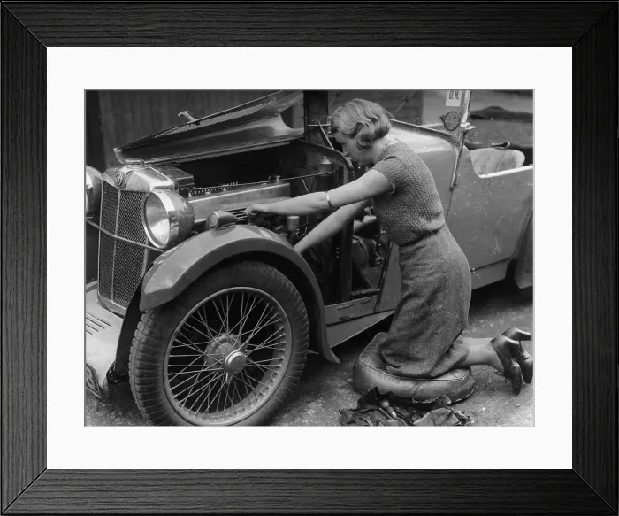 Framed Print : Kitty Brunell working on her MG F Magna Framed Print : Kitty Brunell working on her MG F Magna