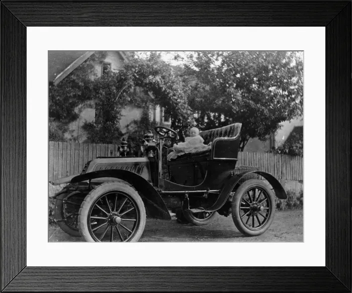 Framed Print : A baby on the seat of a De Dion Bouton car, 1903 Framed Print : A baby on the seat of a De Dion Bouton car, 1903