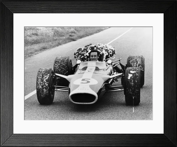 Framed Print : Jim Clark in a Lotus with the winner's laurel wreath Framed Print : Jim Clark in a Lotus with the winner's laurel wreath