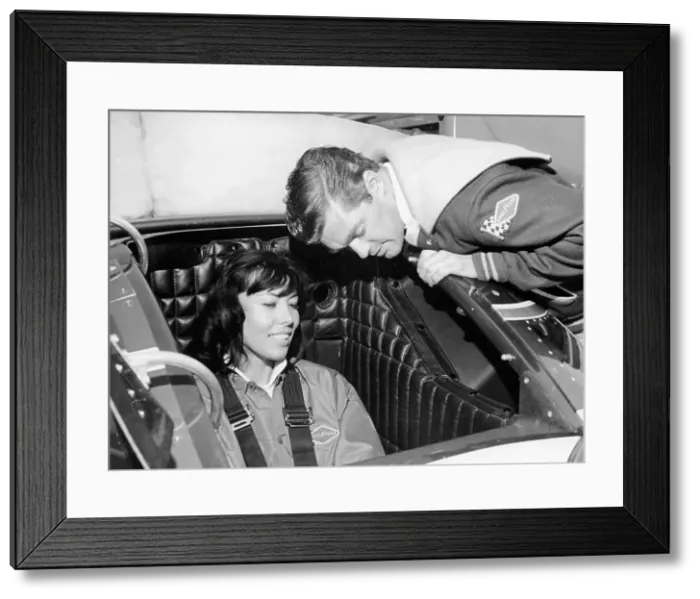Framed Print : Craig Breedlove explaining the controls of Spirit of America Sonic I to his wife, Lee, c1965 Framed Print : Craig Breedlove explaining the controls of Spirit of America Sonic I to his wife, Lee, c1965