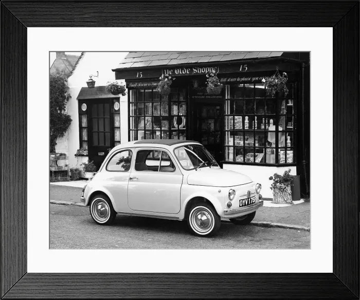 Framed Print : Fiat 500 parked outside a quaint shop, 1969 Framed Print : Fiat 500 parked outside a quaint shop, 1969