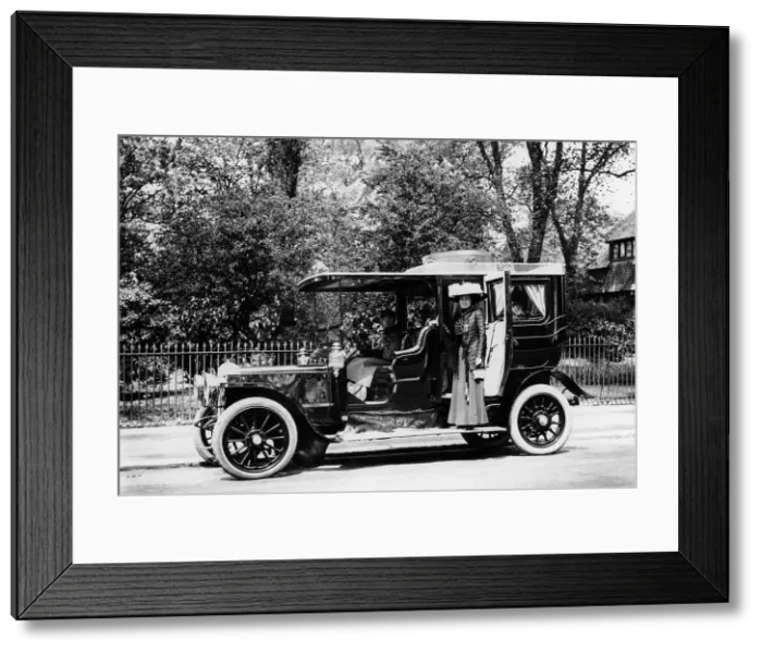 Framed Print : Woman stands by a 1907 / 8 Daimler Framed Print : Woman stands by a 1907 / 8 Daimler