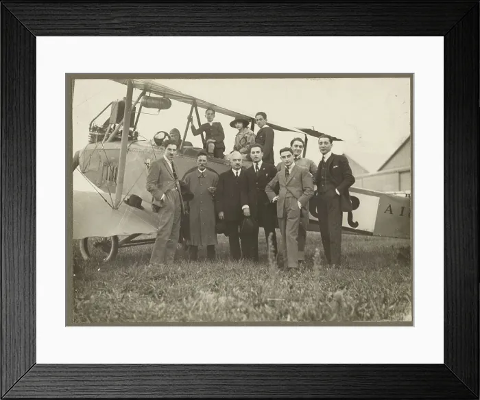 Framed Print : Group portrait in front of plane, 1915-1930. Creator: Fedele Azari Framed Print : Group portrait in front of plane, 1915-1930. Creator: Fedele Azari