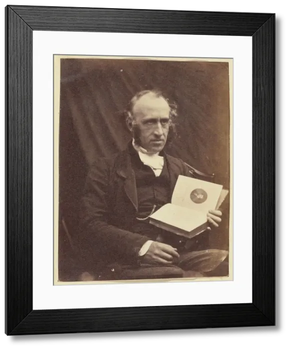 Framed Print : Portrait of Seated Man with a Book, 1870-1875. Creator: Unknown Framed Print : Portrait of Seated Man with a Book, 1870-1875. Creator: Unknown