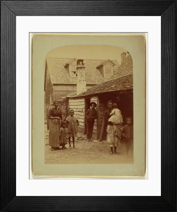 Framed Print : Portrait of a Black family standing in front of a house, 1886. Creator: George Barker Framed Print : Portrait of a Black family standing in front of a house, 1886. Creator: George Barker